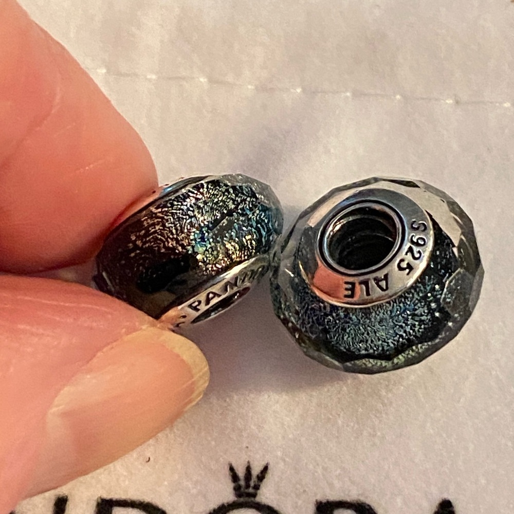 Preowned Pandora Iridescent Blue Facetted Murano Glass Bead.